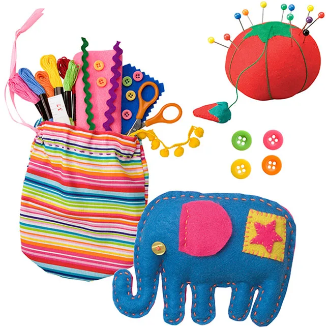 Inside the kit: tomato pin cushion, embroidery floss, scissors, and finished felt projects like this