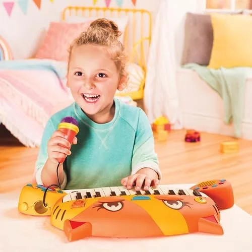 A young player tests the working microphone while exploring the keyboard's twenty preset songs.
