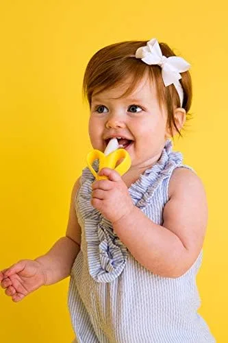 Self-feeding the brush mirrors how babies already explore objects orally, lowering resistance to ora