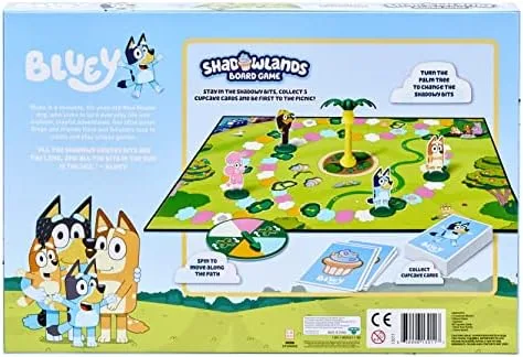 Back-of-box rules summary, illustrating the cupcake-collection objective and the rotating shadow pal