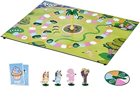 Full board laid out with the four character standees and the spinner that drives turn order.