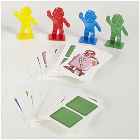 The four gingerbread pawns and color cards — Candy Land's entire mechanical vocabulary, unchanged si