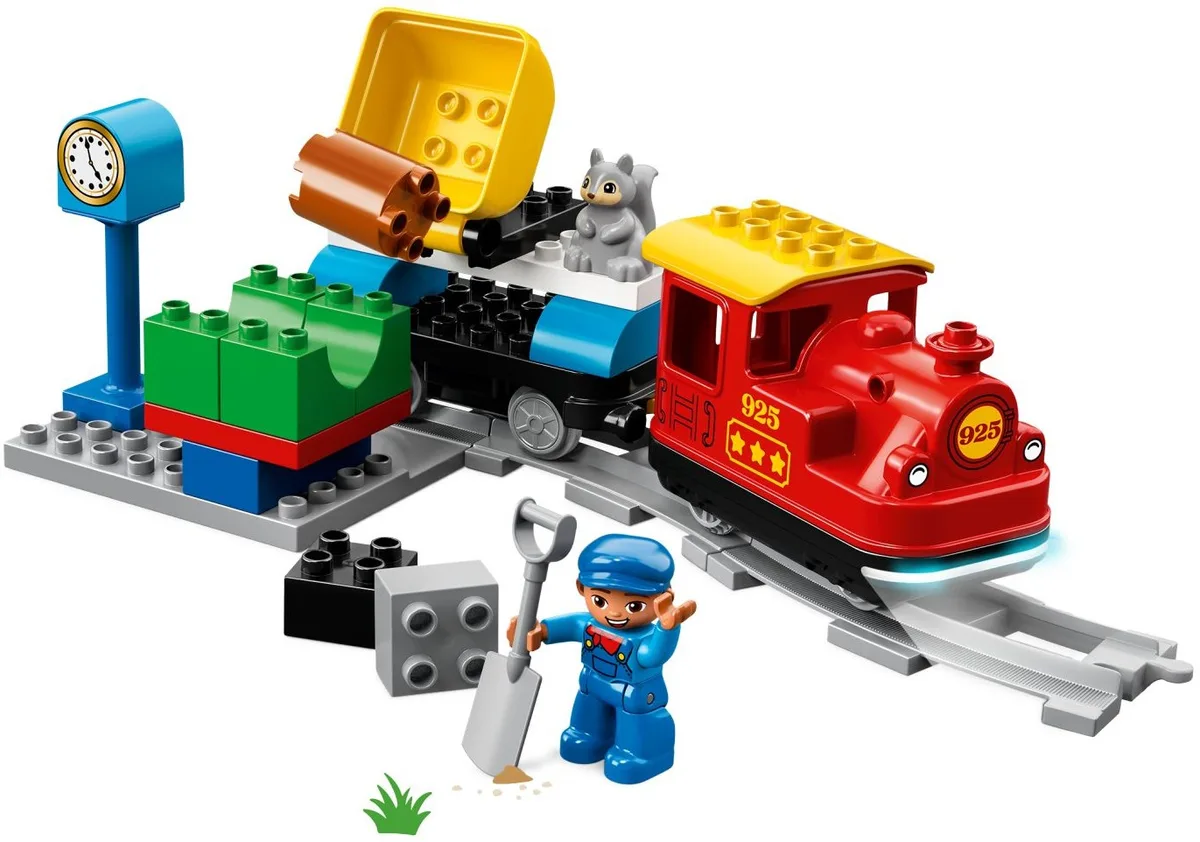 Close-up of the chunky locomotive and tipping coal bucket, sized for toddler hands and rough play.