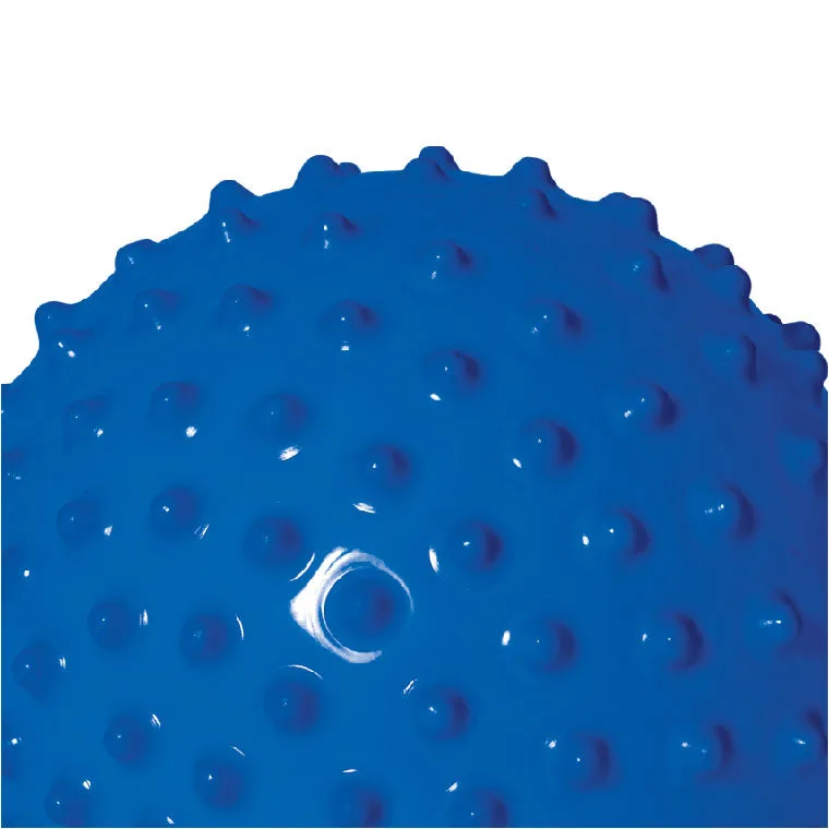 Close detail of the soft nubbed surface designed for grasping and mouthing exploration.
