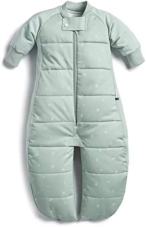 The convertible Sleep Suit Bag in sage, showing the four-way zipper system that distinguishes it fro