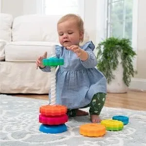 A toddler discovers the SpinAgain's hypnotic helical descent during our hands-on testing sessions.