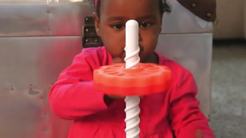 The corkscrew pole transforms each disc drop into a mesmerizing spiral that toddlers replay endlessl