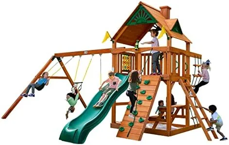 The Chateau's full footprint: fort deck, wave slide, swing beam, and rock wall in studio view.