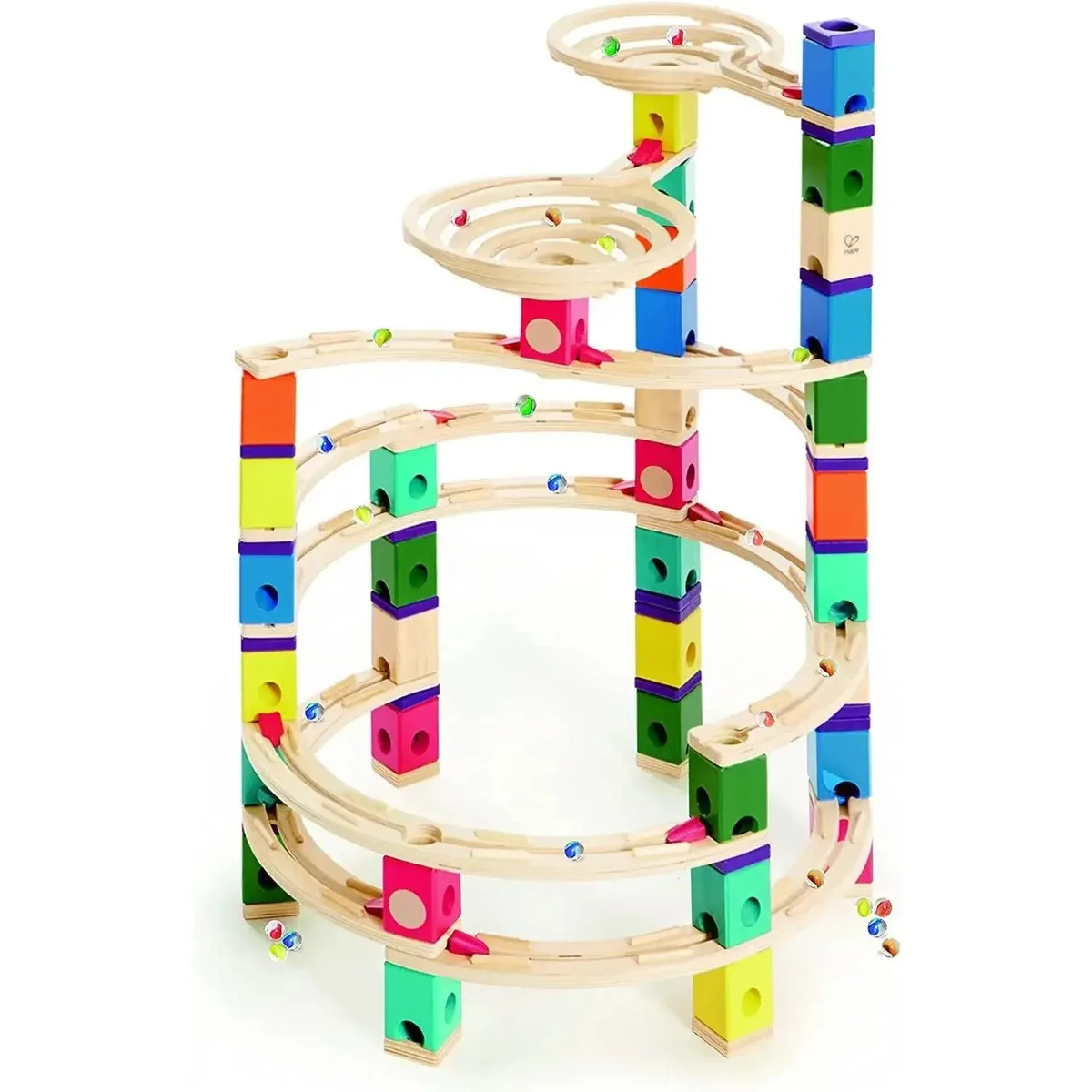 The full Quadrilla tower in action: spirals, accelerators, and tracks routing marbles through dozens
