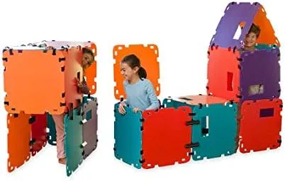 Two children inside a multi-room build using the colored panels and connector joints.