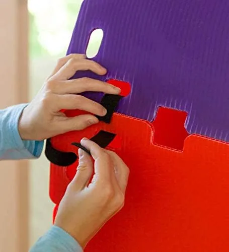 Close-up of the velcro-style strap that joins two panels at a corner, the kit's primary fastener.
