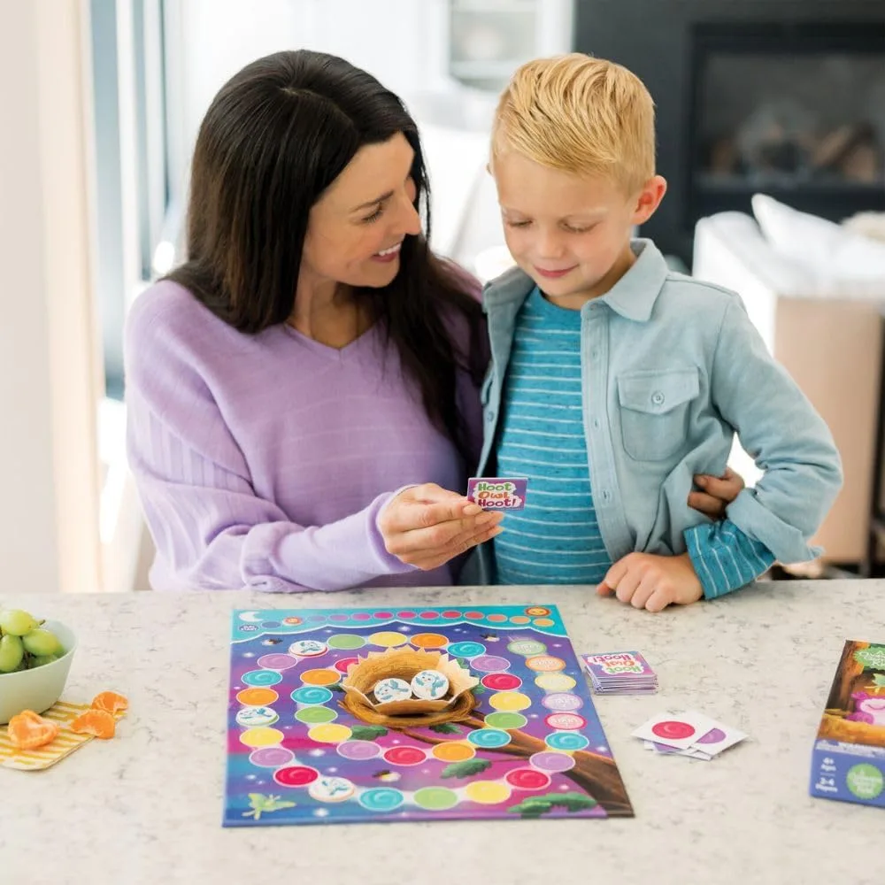 A parent and child share a single card, deliberating together over which owl should move next.