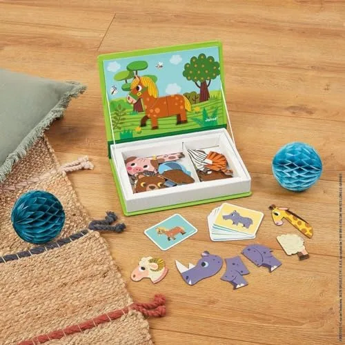 On a rug at home, the open book stays organized while pieces wait nearby.