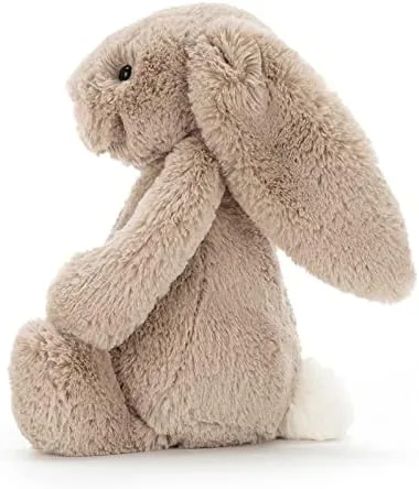 A side profile reveals the silhouette and white tail that make this bunny instantly recognizable.