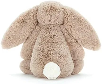 From the back: long ears, soft body, and the tufted tail children gravitate toward.