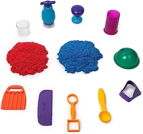 Laid out flat, the kit reveals exactly what arrives in the box: tools, molds, and two sand colors.