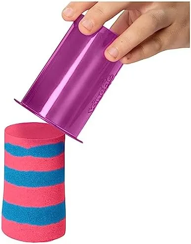 A cylindrical mold lifts cleanly off a striped column, the moment that explains every viral video.