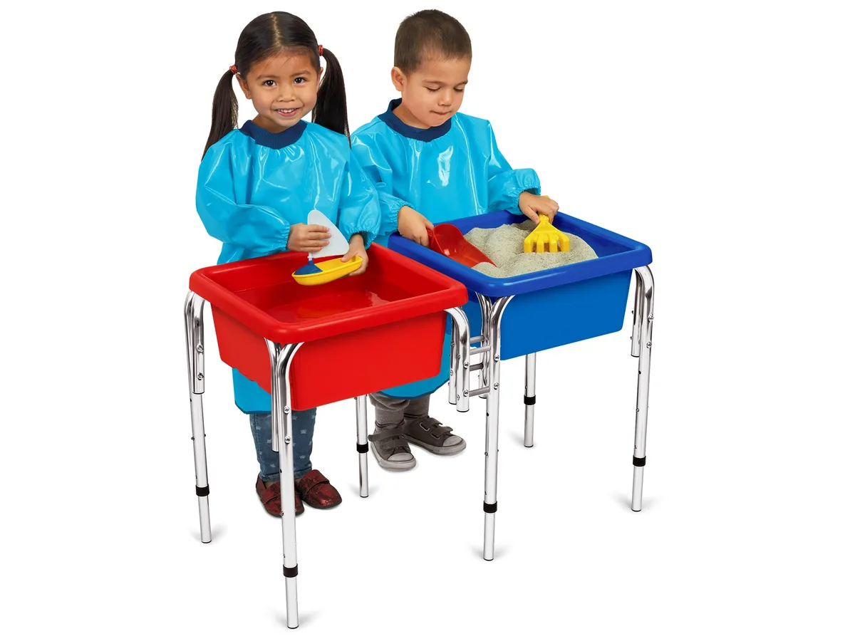 The dual-bin configuration lets two children explore different sensory media side by side.