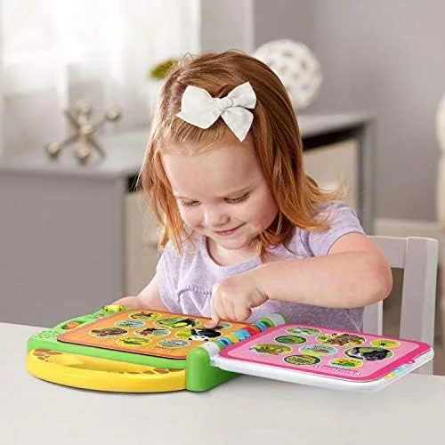 A toddler tester explores the touch-sensitive pages during our six-week trial.