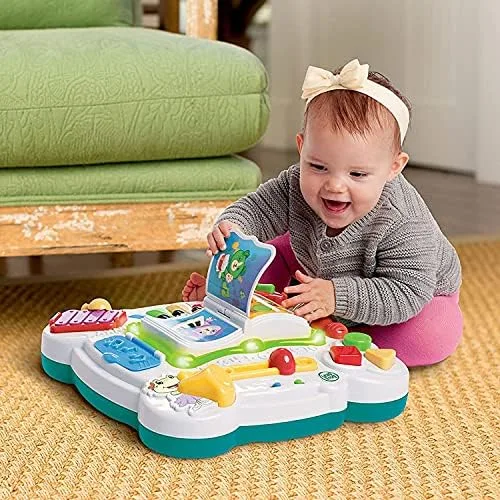 Tummy-time floor configuration with legs detached for younger babies still developing core strength.