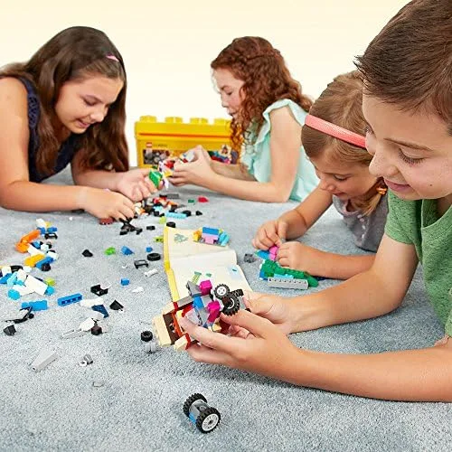 Four children, one carpet, and the unstructured time that turns a pile of bricks into something spec