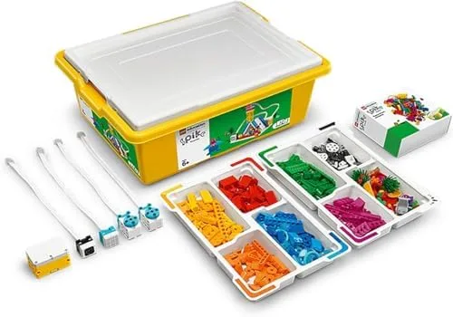 The full SPIKE Essential kit: storage tub, hub, motor, sensors, and roughly 449 sorted bricks.