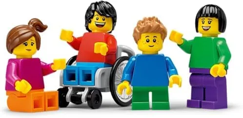 The set's four minifigures, including a wheelchair user — a small but deliberate inclusion choice.