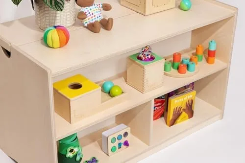 Closer in: each object gets its own bay, an implicit invitation for the child to choose one thing an