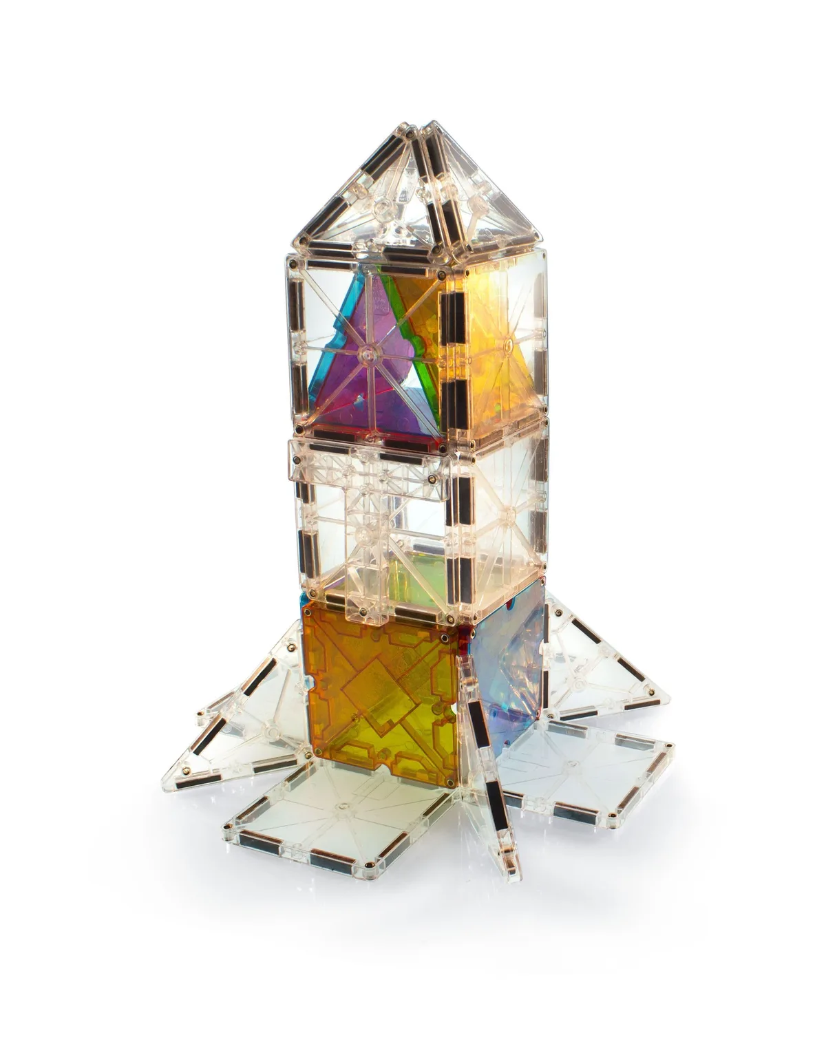 A rocket built mostly from clear tiles, lit from below to show the prismatic interior.