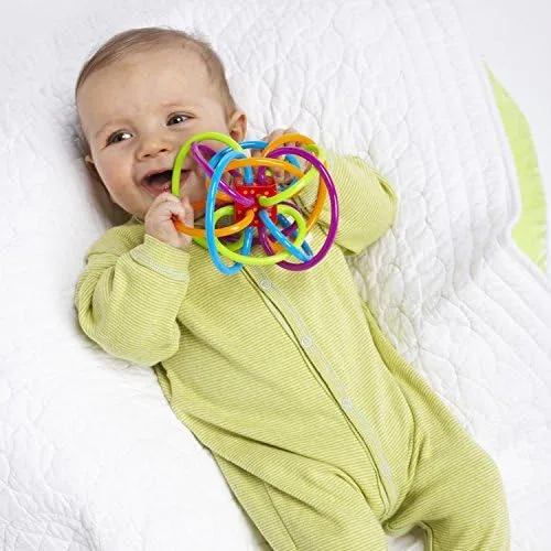 An infant in our test cohort gums the Winkel's tubes; the loops give teething molars something to bi