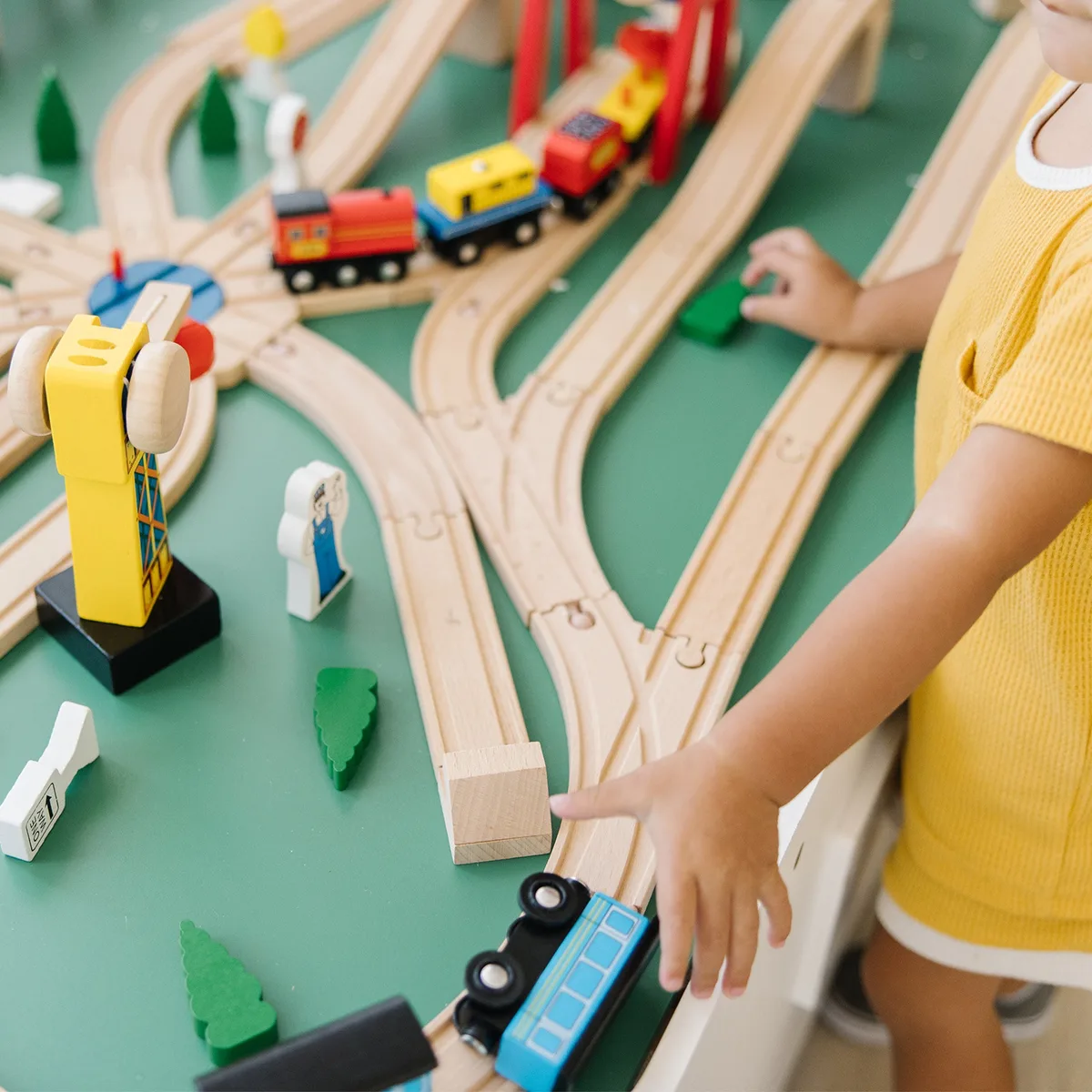 Track switches and accessory pieces in use — the engineering choices that make a wooden railway sing