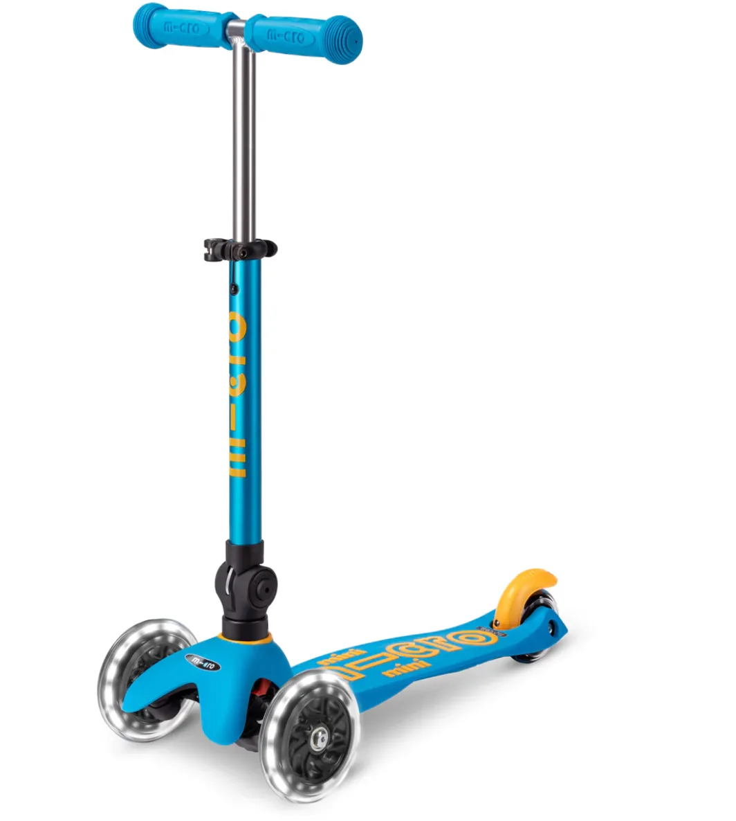 Yellow and teal version with illuminated wheels: a striking, durable choice for nighttime sidewalk r