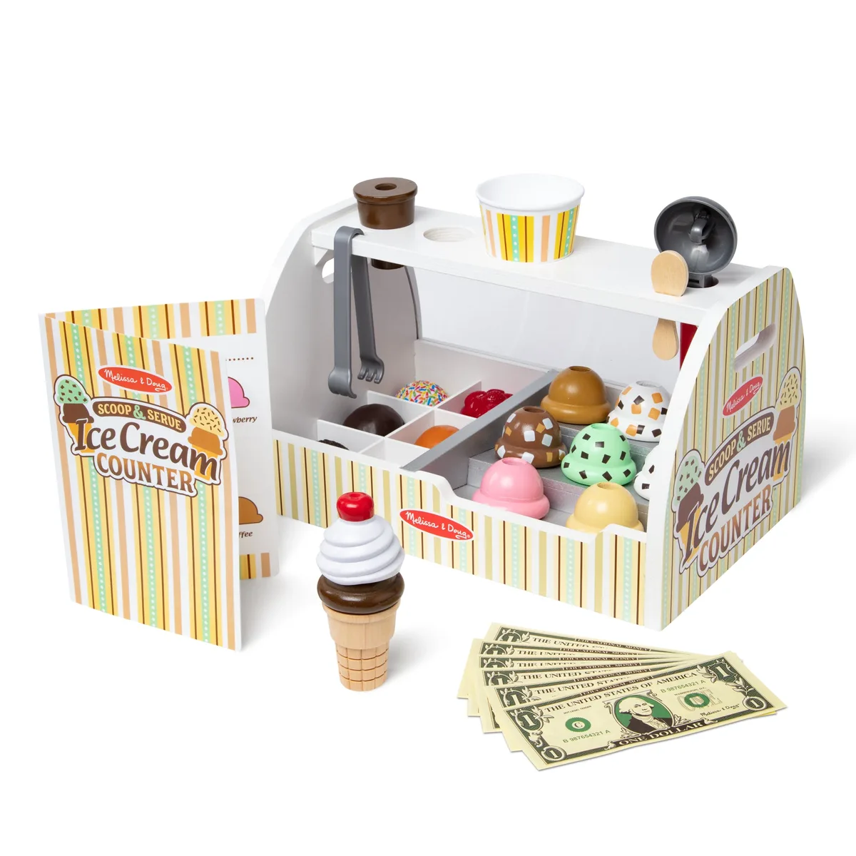 Detail of the included play money and stackable scoops: the math practice happens almost invisibly.