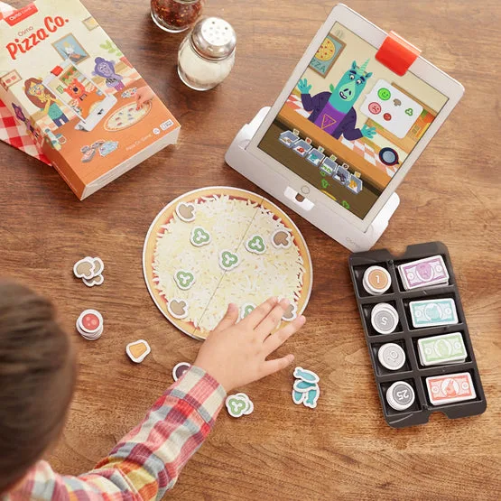 Overhead view of the felt pizza, coin drawer, and tablet character mid-order.