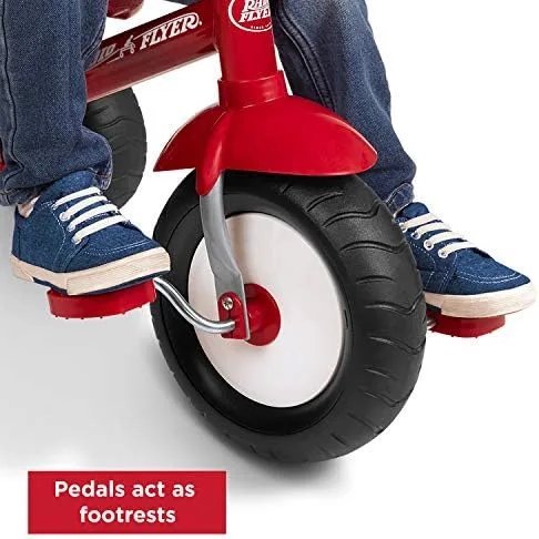 The pedals double as footrests during the parent-push stage, before the child takes over the drivetr