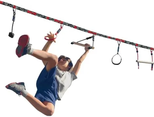 A child mid-swing between the rings, the kind of effort that adds up to real upper-body strength ove