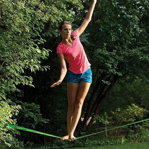 Single-foot balance moment: postural muscles firing as the line oscillates beneath her.