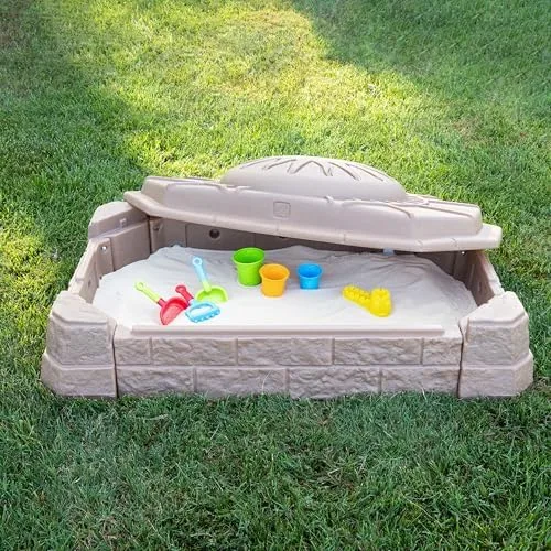 The molded lid lifts off cleanly, sealing the basin against weather, leaves, and neighborhood cats.