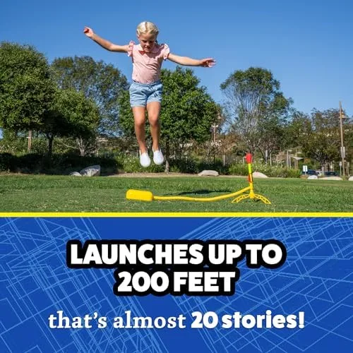 A young tester airborne over the launcher — the foot-stomp loop produces an immediate, irresistible 