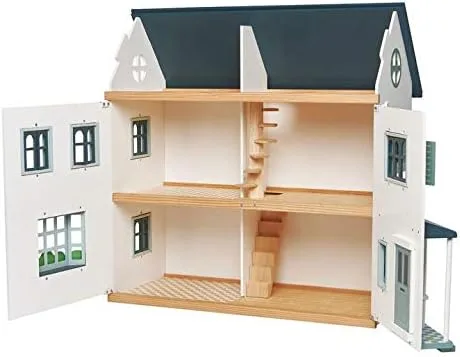 The interior reveals two open floors connected by a curving wooden staircase, ready for furnishing.