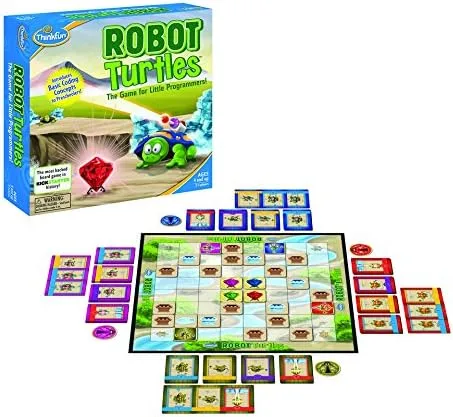 The Robot Turtles board, instruction cards, and gem tokens lay out the full Kickstarter-funded codin