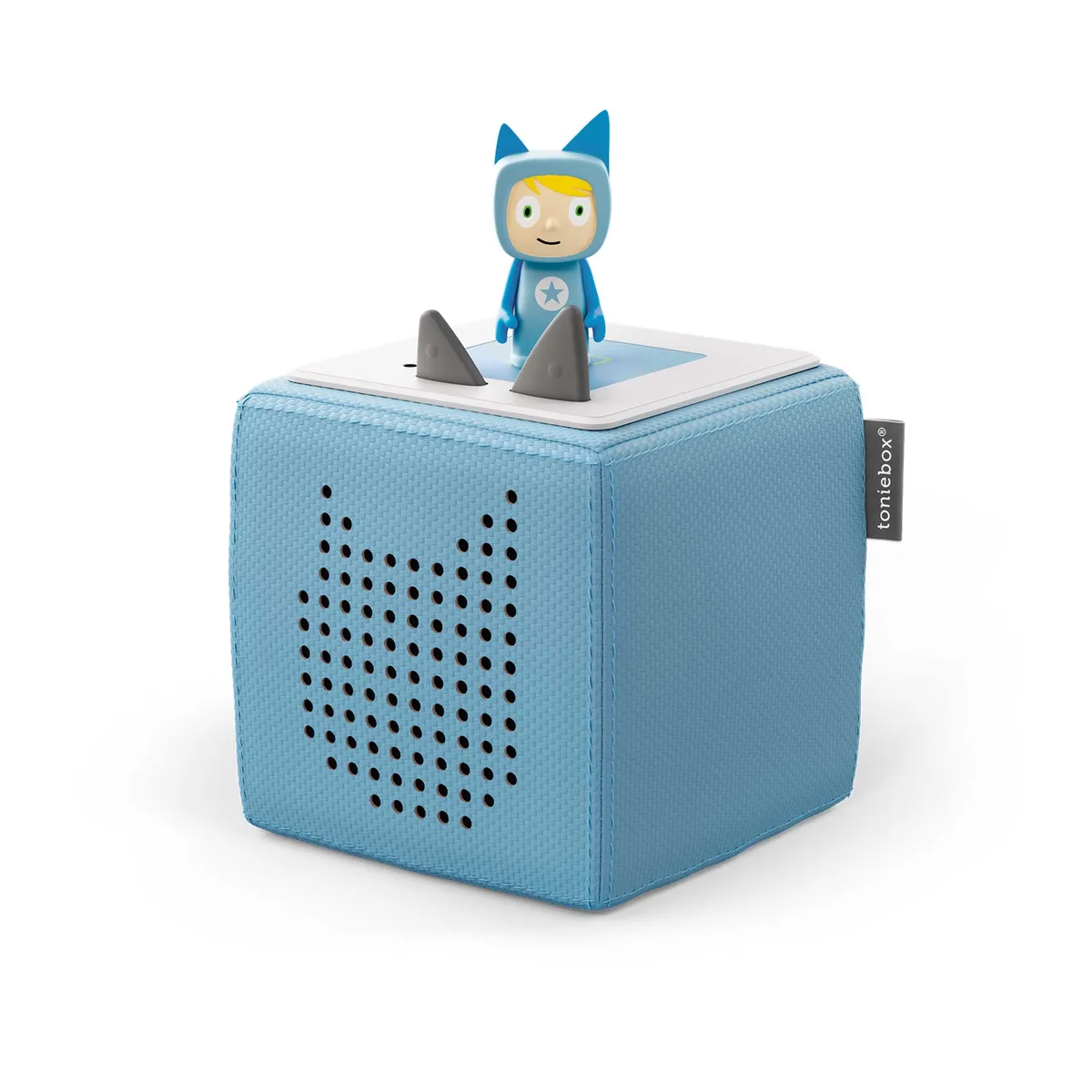 The light-blue Toniebox with its included Creative-Tonie figure docked on the magnetic top.