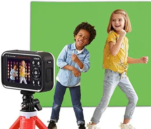 The included green screen lets children composite themselves into custom backgrounds, the camera's m