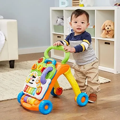 A toddler at standing height pushes the walker — the recommended use case, not seated riding.