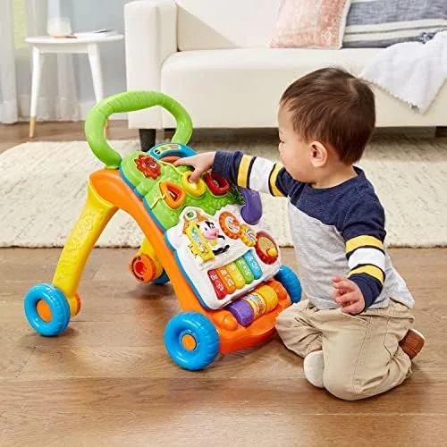 Crouched play at the activity panel — the panel works detached from the wheels.