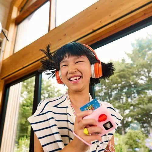Bluetooth pairing with headphones lets older children listen privately on the go.